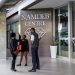 People stand outside the main entrance of the Namibian Diamonds Trading Company on June 21, 2017 in Windhoek, Namibia.